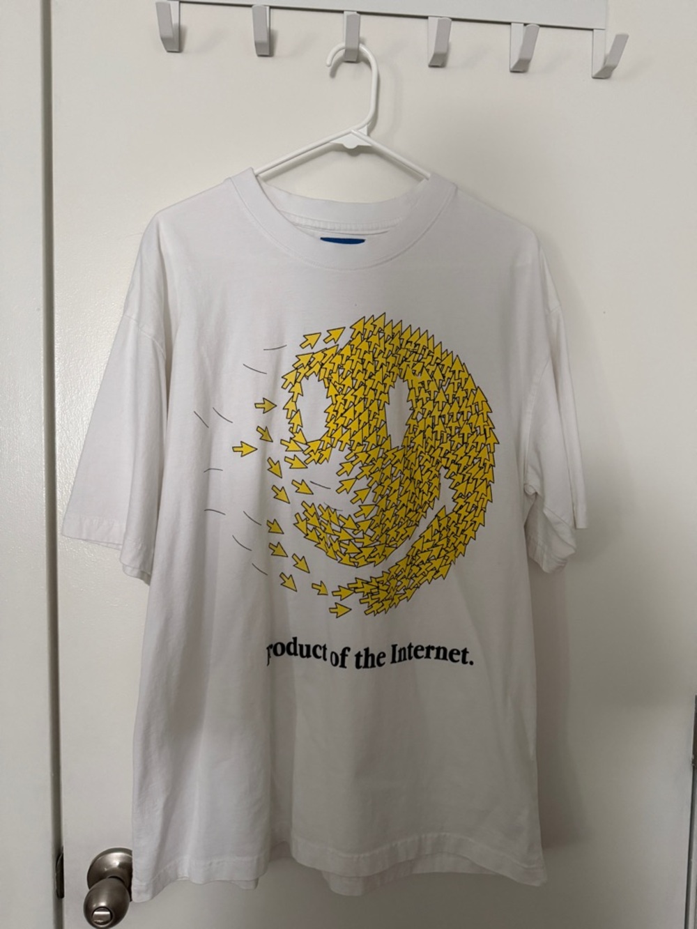 “Product of the Internet” White Short Sleeve Graphic Tee with Yellow Arrow Smile